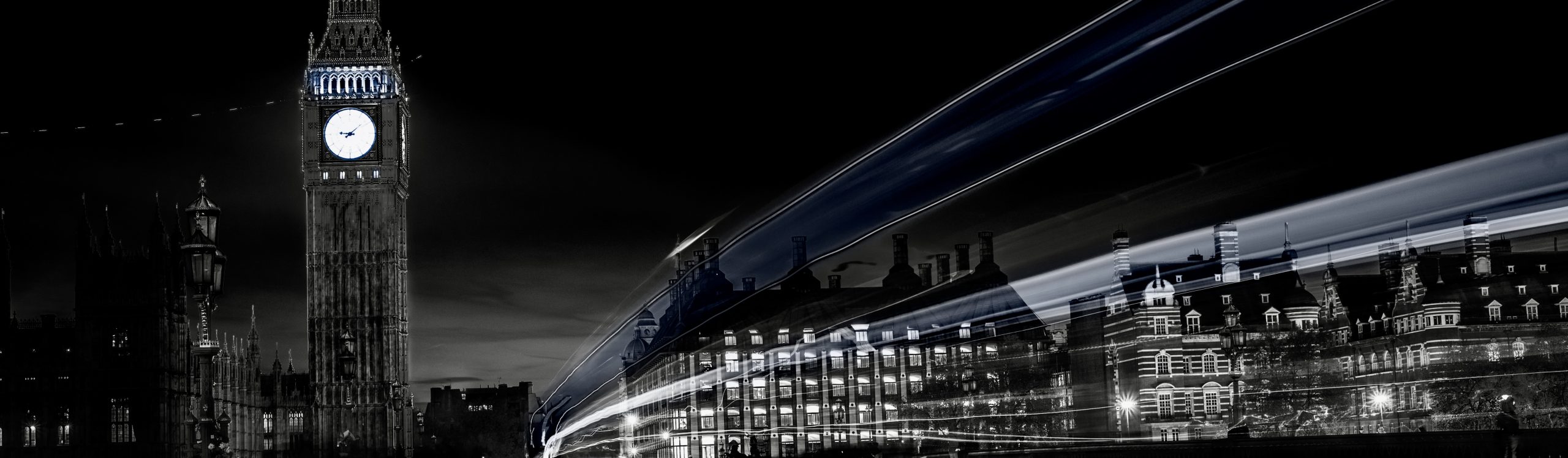 Big Ben at night with car light trails